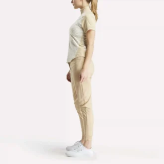 Haut à manches courtes et fermeture éclair 1/4 avec imprimé mini argyle pour femme