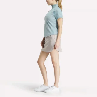 Haut à manches courtes et fermeture éclair 1/4 avec imprimé mini argyle pour femme