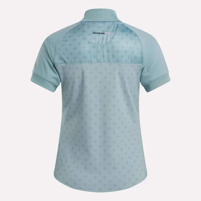 Haut à manches courtes et fermeture éclair 1/4 avec imprimé mini argyle pour femme