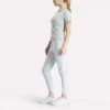 Polo de golf moulant à manches courtes et fermeture éclair pour femme Polo de golf moulant à manches courtes et fermeture éclair pour femme