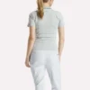 Polo de golf moulant à manches courtes et fermeture éclair pour femme Polo de golf moulant à manches courtes et fermeture éclair pour femme