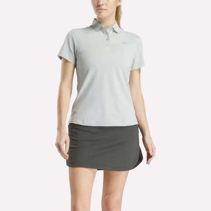 Polo à manches courtes et patte de boutonnage en piqué extensible pour femme