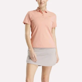 Polo à manches courtes et patte de boutonnage en piqué extensible pour femme