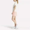 Polo à manches courtes et patte de boutonnage en piqué extensible pour femme