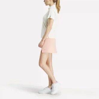 Polo à manches courtes et patte de boutonnage en piqué extensible pour femme