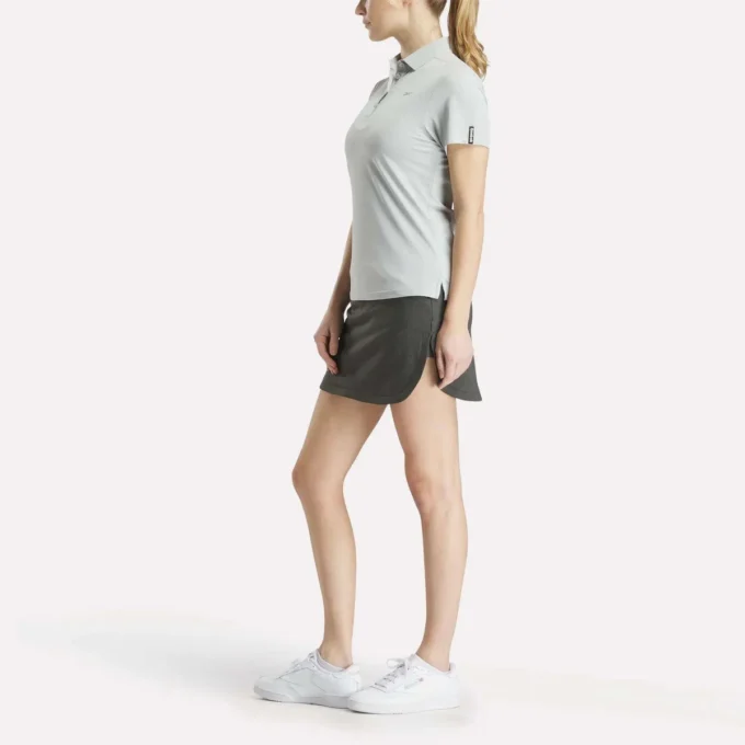 Polo à manches courtes et patte de boutonnage en piqué extensible pour femme