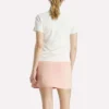 Polo à manches courtes et patte de boutonnage en piqué extensible pour femme