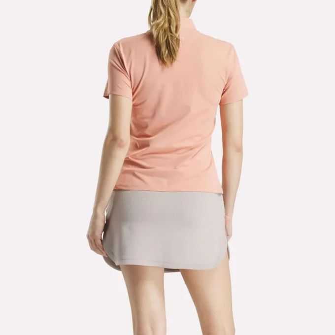 Polo à manches courtes et patte de boutonnage en piqué extensible pour femme Polo à manches courtes et patte de boutonnage en piqué extensible pour femme