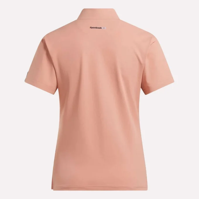 Polo à manches courtes et patte de boutonnage en piqué extensible pour femme Polo à manches courtes et patte de boutonnage en piqué extensible pour femme