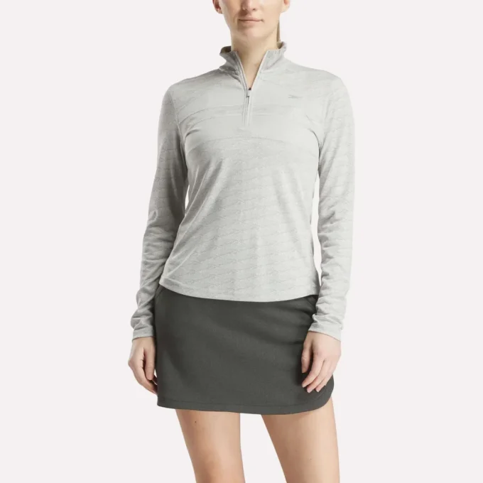 Pull de golf à manches longues et fermeture éclair 1/4 en jacquard Vector pour femmes