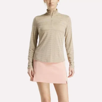 Pull de golf à manches longues et fermeture éclair 1/4 en jacquard Vector pour femmes