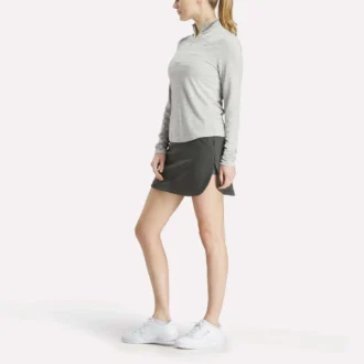 Pull de golf à manches longues et fermeture éclair 1/4 en jacquard Vector pour femmes