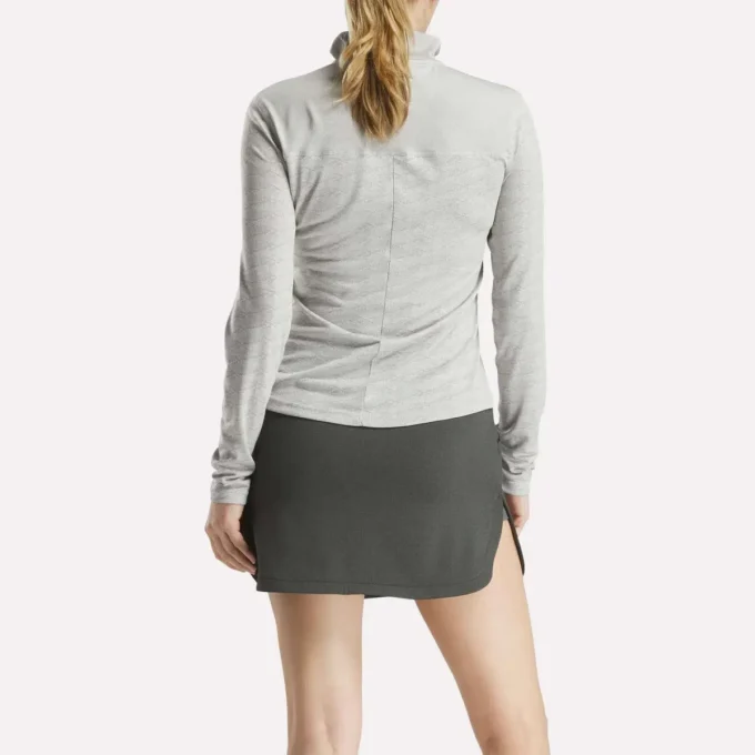 Pull de golf à manches longues et fermeture éclair 1/4 en jacquard Vector pour femmes