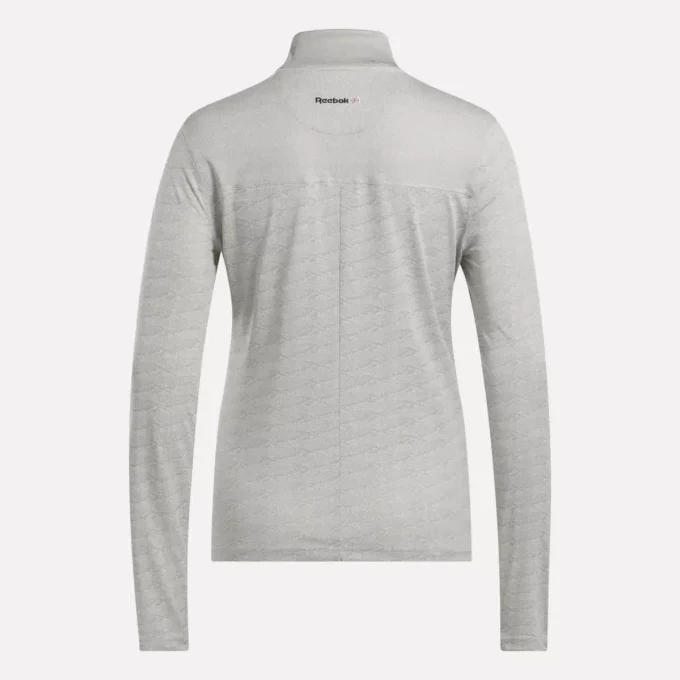 Pull de golf à manches longues et fermeture éclair 1/4 en jacquard Vector pour femmes