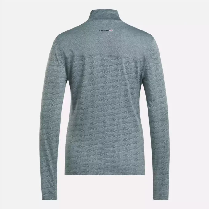 Pull de golf à manches longues et fermeture éclair 1/4 en jacquard Vector pour femmes Pull de golf à manches longues et fermeture éclair 1/4 en jacquard Vector pour femmes