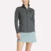 Veste de golf à fermeture éclair intégrale et coutures performantes pour femmes