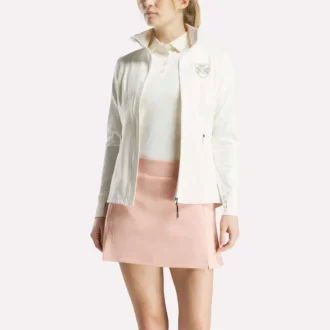 Veste de golf à fermeture éclair intégrale et coutures performantes pour femmes