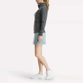 Veste de golf à fermeture éclair intégrale et coutures performantes pour femmes