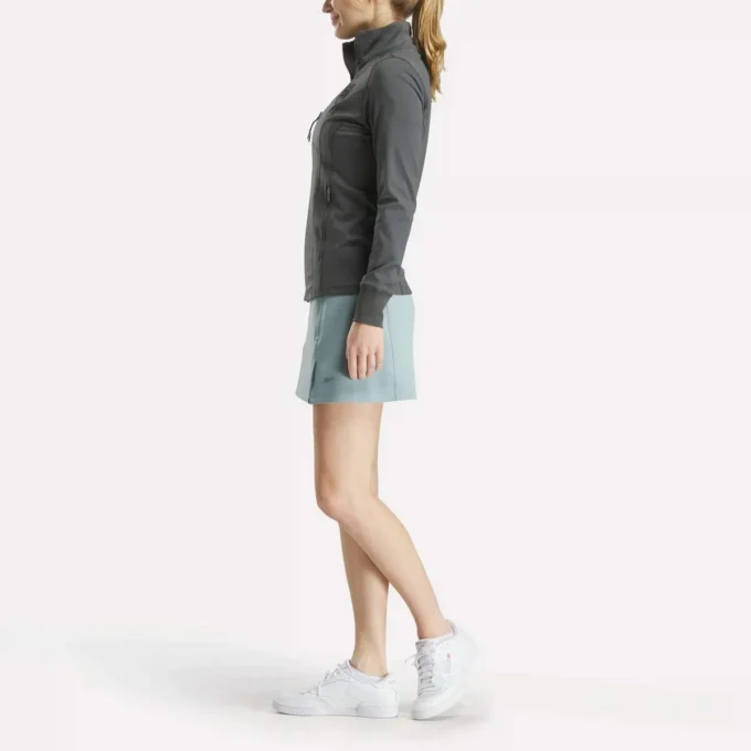Veste de golf à fermeture éclair intégrale et coutures performantes pour femmes