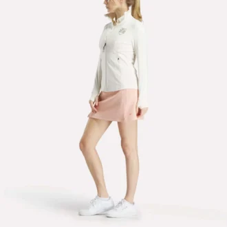 Veste de golf à fermeture éclair intégrale et coutures performantes pour femmes