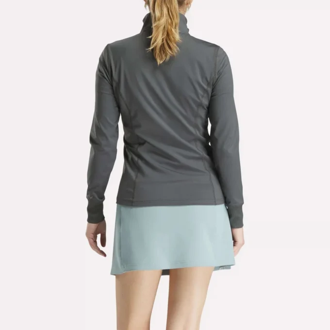Veste de golf à fermeture éclair intégrale et coutures performantes pour femmes
